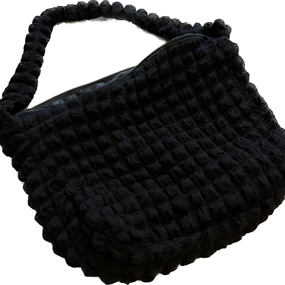 Brand new sling bag - black and textured